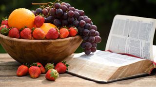 Open Bible with Fruit