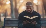 Man on Bench Reading Bible (153169)