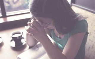 Woman in Prayer